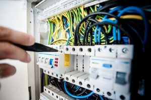 how much do electricians charge per hour​